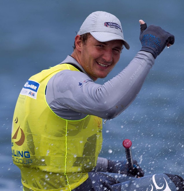 Giles Scott, (GBR) who came first over all in the Finn class on the day 6 of the Skandia Sail for Gold Regatta, in Weymouth and Portland, the 2012 Olympic venue. &copy; onEdition http://www.onEdition.com
